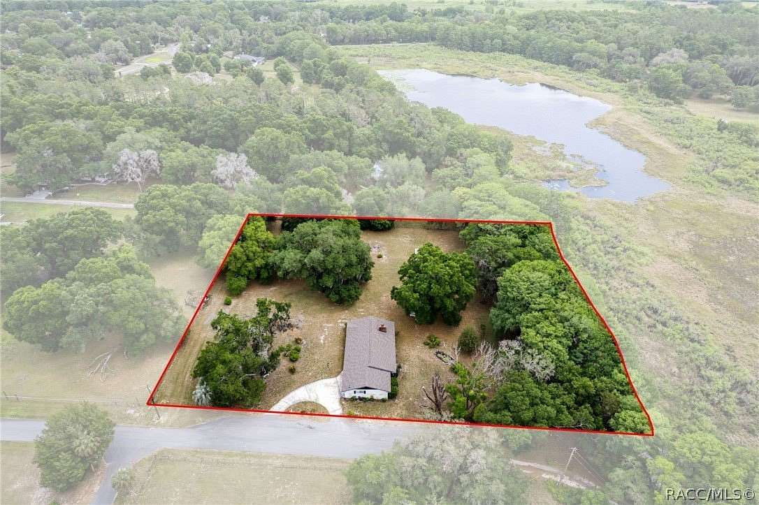 2.46 Acres of Land with Home for Sale in Floral City, Florida