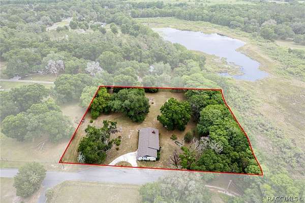 2.46 Acres of Land with Home for Sale in Floral City, Florida