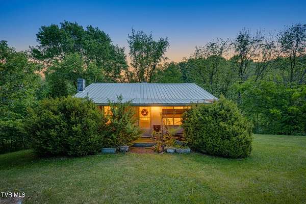 5.1 Acres of Land with Home for Sale in Piney Flats, Tennessee