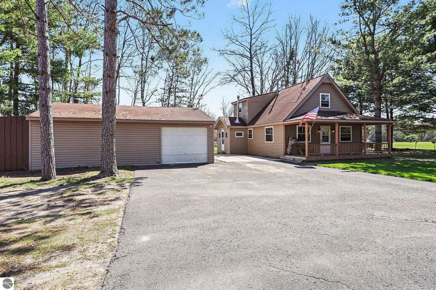 20 Acres of Recreational Land with Home for Sale in Lake, Michigan