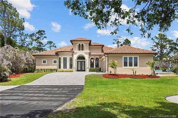 4.74 Acres of Land with Home for Sale in Palm City, Florida