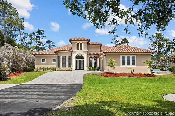 4.74 Acres of Land with Home for Sale in Palm City, Florida