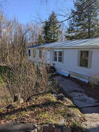 2.13 Acres of Land with Home for Sale in Albany, New Hampshire