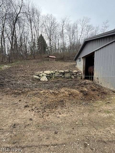 23.7 Acres of Land with Home for Auction in Fresno, Ohio