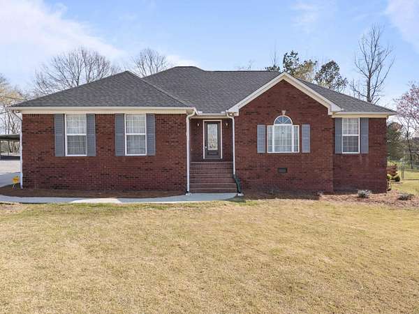 5.84 Acres of Land with Home for Sale in Vinemont, Alabama
