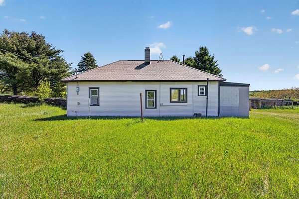 2 Acres of Land with Home for Sale in Tustin, Michigan