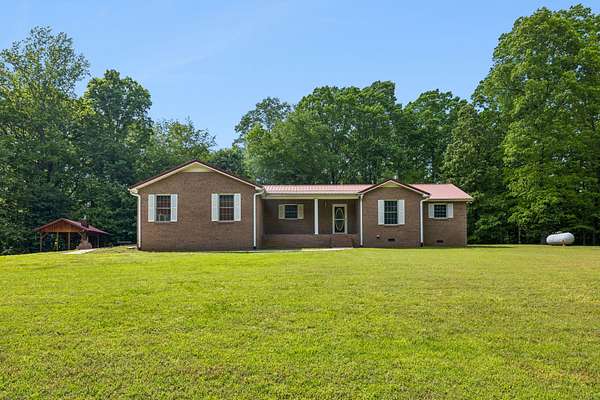 8.78 Acres of Land with Home for Sale in Estill Springs, Tennessee