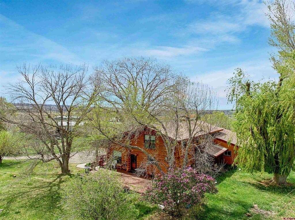 30 Acres of Land with Home for Sale in Hotchkiss, Colorado