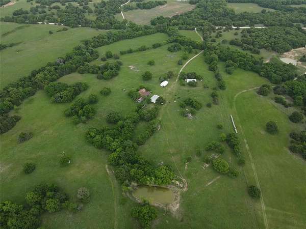 160 Acres of Agricultural Land with Home for Sale in Bowie, Texas