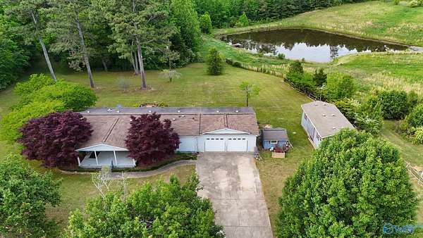13.5 Acres of Land with Home for Sale in Boaz, Alabama