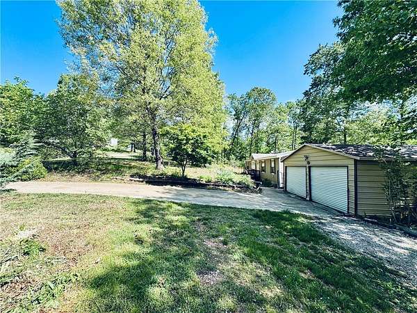 1.77 Acres of Land with Home for Sale in Rogers, Arkansas