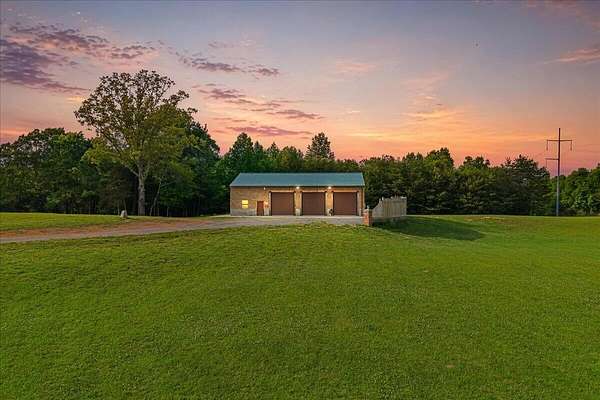 9.52 Acres of Land with Home for Sale in Athens, Tennessee