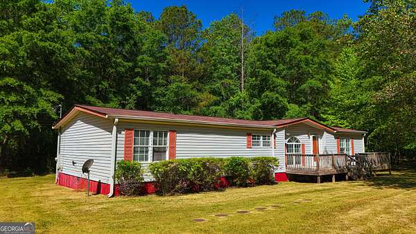 9.68 Acres of Land with Home for Sale in Forsyth, Georgia