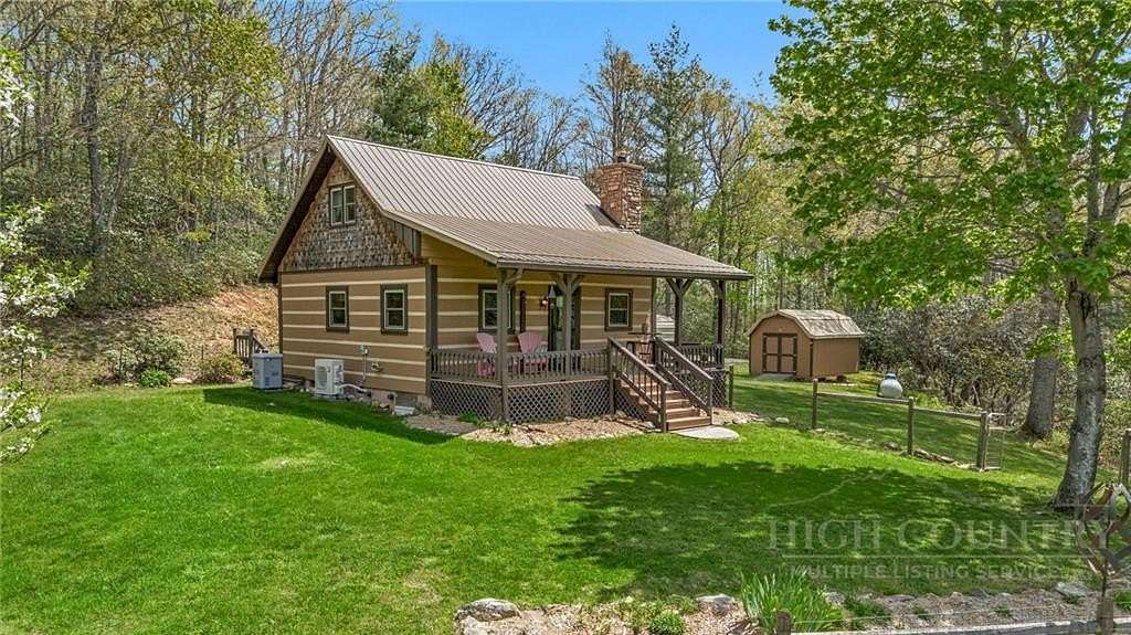 9.35 Acres of Land with Home for Sale in Grassy Creek, North Carolina