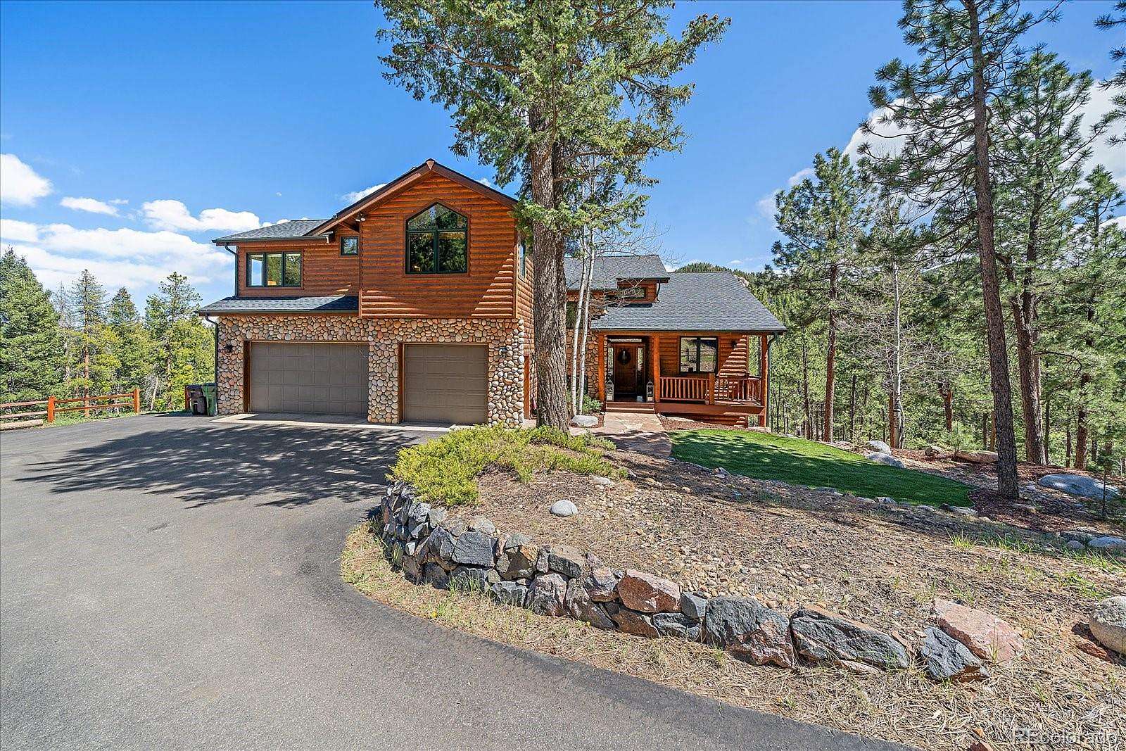 5 Acres of Land with Home for Sale in Evergreen, Colorado
