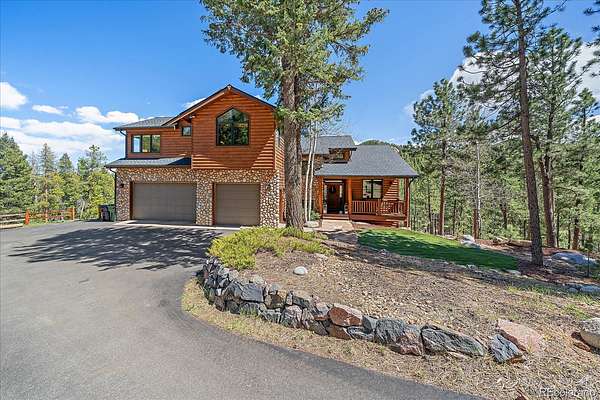 5 Acres of Land with Home for Sale in Evergreen, Colorado