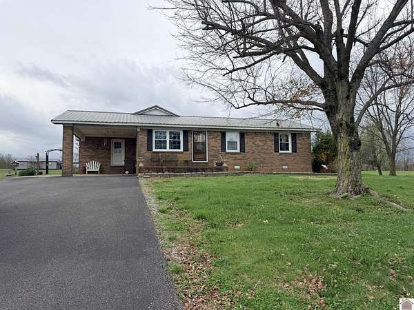 1.68 Acres of Land with Home for Auction in Mayfield, Kentucky