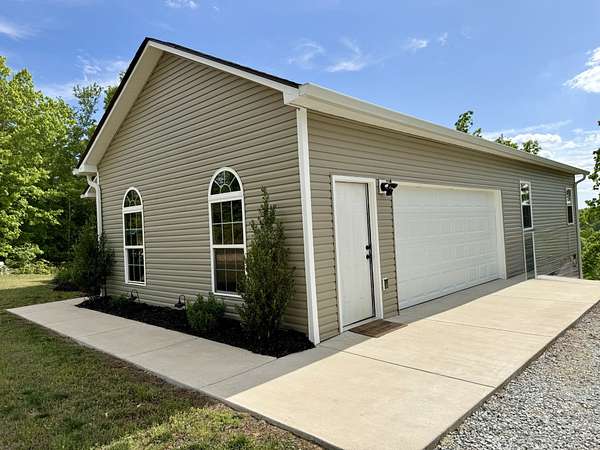 7.19 Acres of Land with Home for Sale in Hohenwald, Tennessee