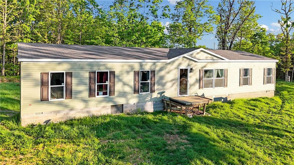 7.3 Acres of Land with Home for Sale in Washburn, Missouri