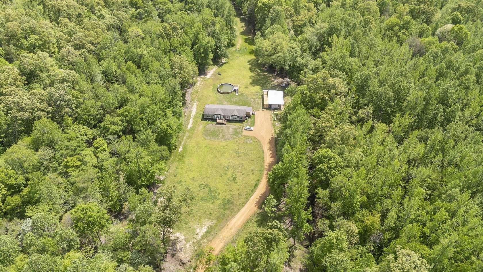 50.8 Acres of Land with Home for Sale in Toone, Tennessee