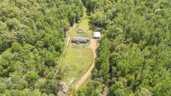 50.8 Acres of Land with Home for Sale in Toone, Tennessee