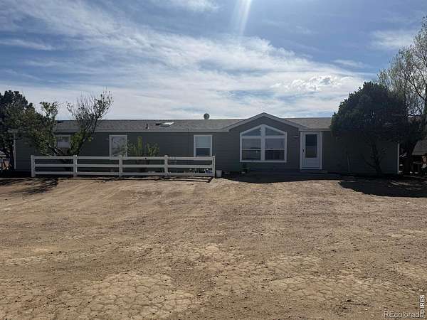 78.7 Acres of Land with Home for Sale in Galeton, Colorado