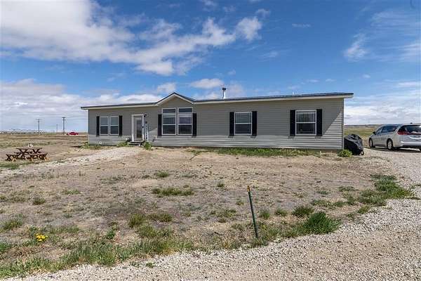 2.75 Acres of Land with Home for Sale in Powell, Wyoming