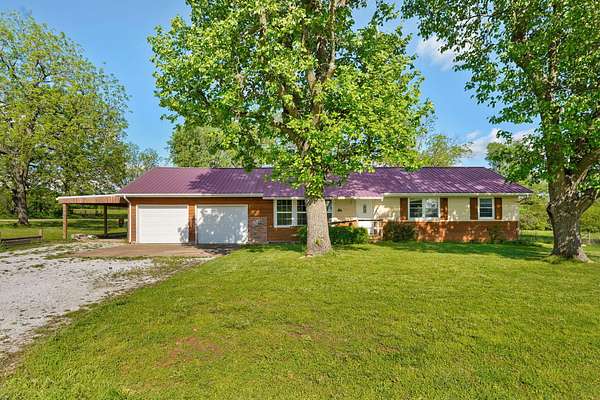 9.2 Acres of Land with Home for Sale in Mount Vernon, Missouri