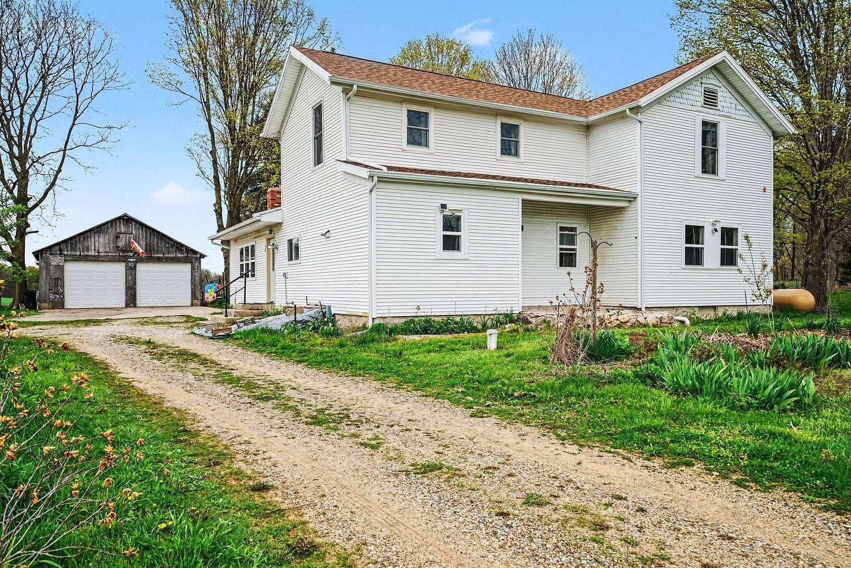 3.33 Acres of Land with Home for Sale in Jones, Michigan