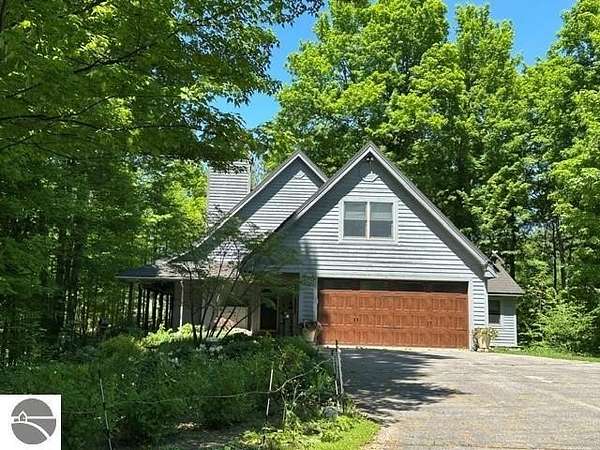 14.1 Acres of Land with Home for Sale in Bellaire, Michigan
