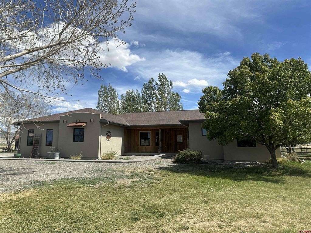 33.8 Acres of Land with Home for Sale in Olathe, Colorado