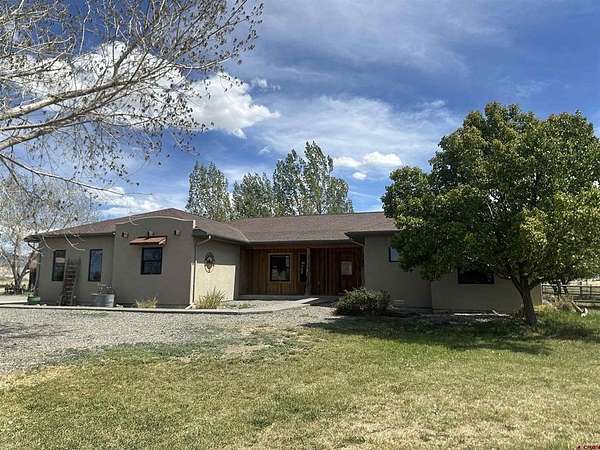 33.8 Acres of Land with Home for Sale in Olathe, Colorado