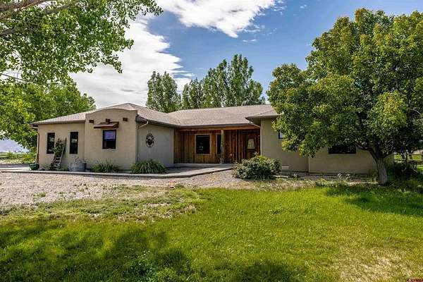 33.8 Acres of Land with Home for Sale in Olathe, Colorado