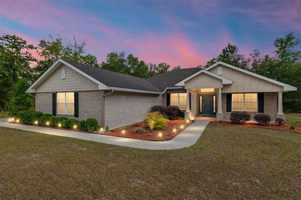 4.8 Acres of Land with Home for Sale in High Springs, Florida