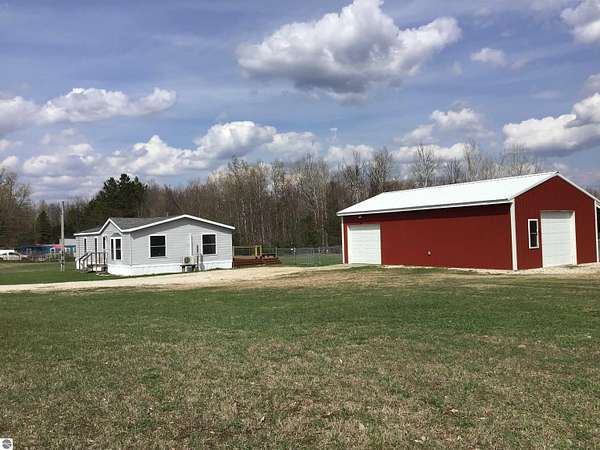 2 Acres of Land with Home for Sale in Manton, Michigan