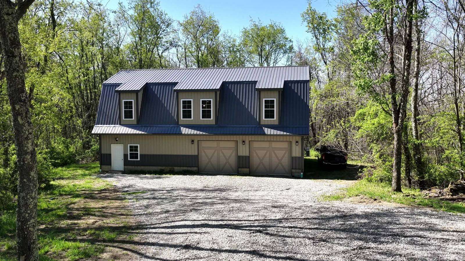 10.5 Acres of Recreational Land with Home for Sale in Jacobsburg, Ohio