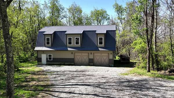 10.5 Acres of Recreational Land with Home for Sale in Jacobsburg, Ohio