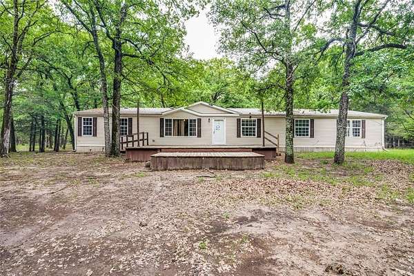 9 Acres of Land with Home for Sale in Quinlan, Texas
