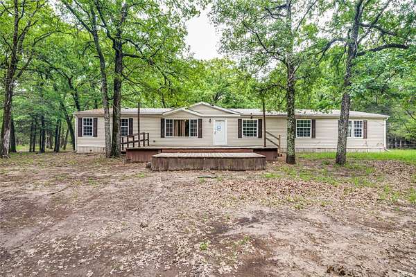 9 Acres of Land with Home for Sale in Quinlan, Texas