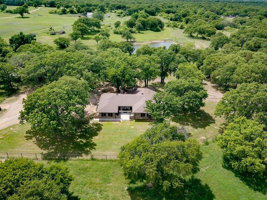 9.79 Acres of Land with Home for Sale in Chico, Texas