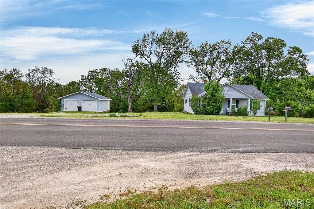 9.15 Acres of Land with Home for Sale in Laquey, Missouri