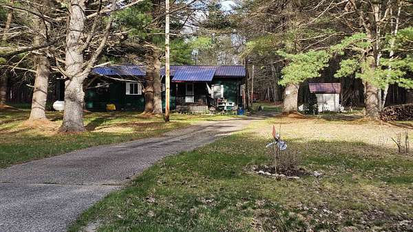12 Acres of Land with Home for Sale in Gladwin, Michigan