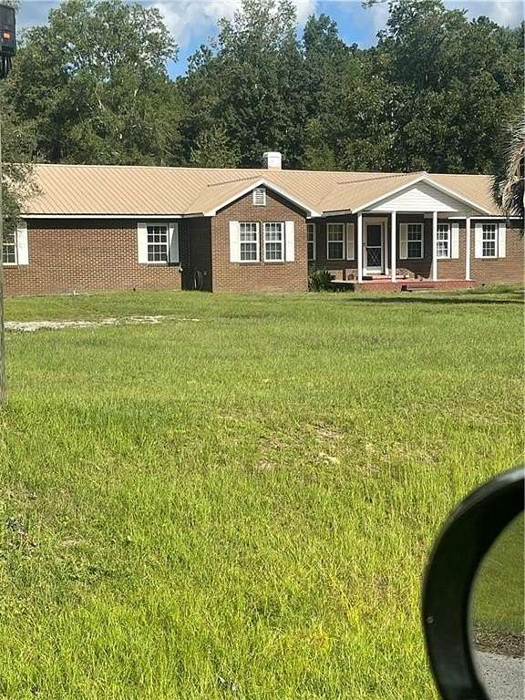 7.74 Acres of Land with Home for Sale in Alma, Georgia