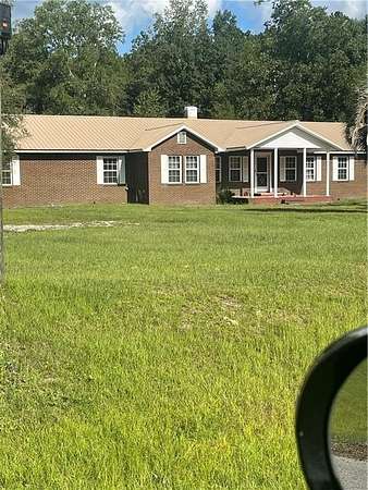 7.74 Acres of Land with Home for Sale in Alma, Georgia