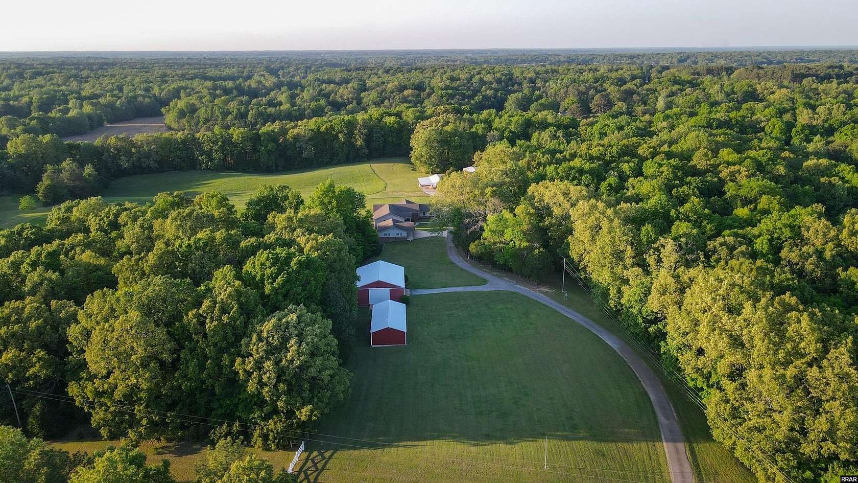 21.1 Acres of Land with Home for Sale in Martin, Tennessee