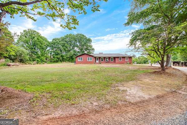 17.4 Acres of Recreational Land with Home for Sale in Eastanollee, Georgia