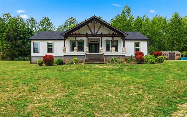 37.8 Acres of Land with Home for Sale in Canmer, Kentucky