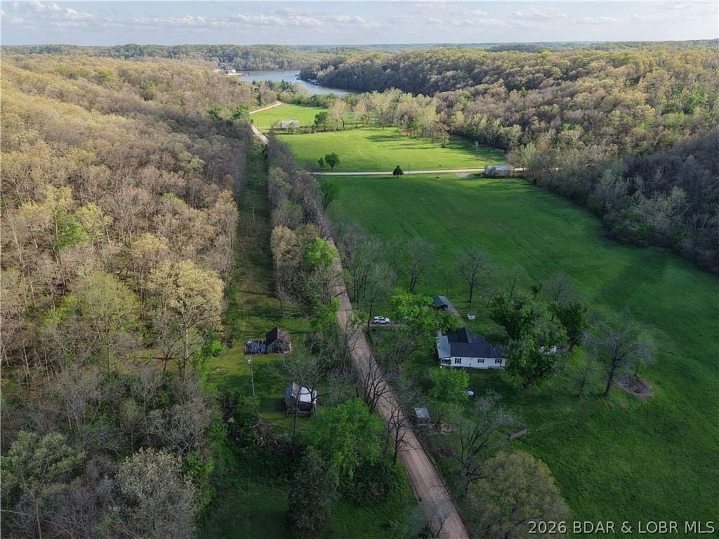 80 Acres of Land with Home for Sale in Gravois Mills, Missouri