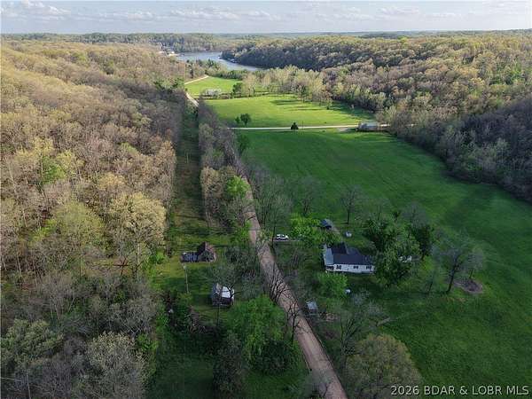 80 Acres of Land with Home for Sale in Gravois Mills, Missouri