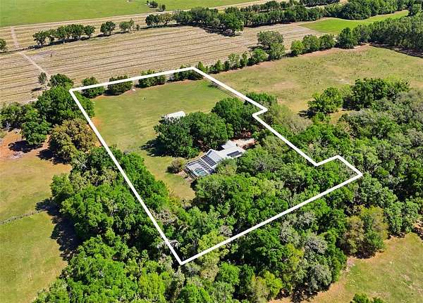 5.25 Acres of Land with Home for Sale in Alachua, Florida